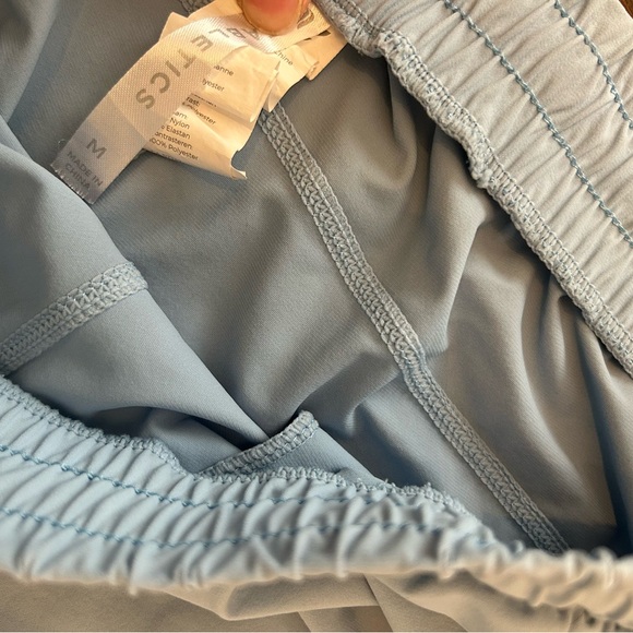 Fabletics Light Gray Athletic Shorts with Pink Logo - Picture 2 of 3